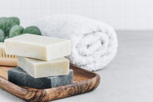 Soap. Organic soap bars. Stack of natural soap bars on gray stone background