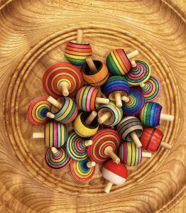 Colorful handcrafted wooden spinning tops!